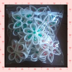 Bag of handmade snowflake ornaments
